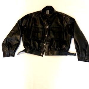 A Versona Black Jacket, Size Large, 55% Polyurethane, 45% Rayon Lining.
